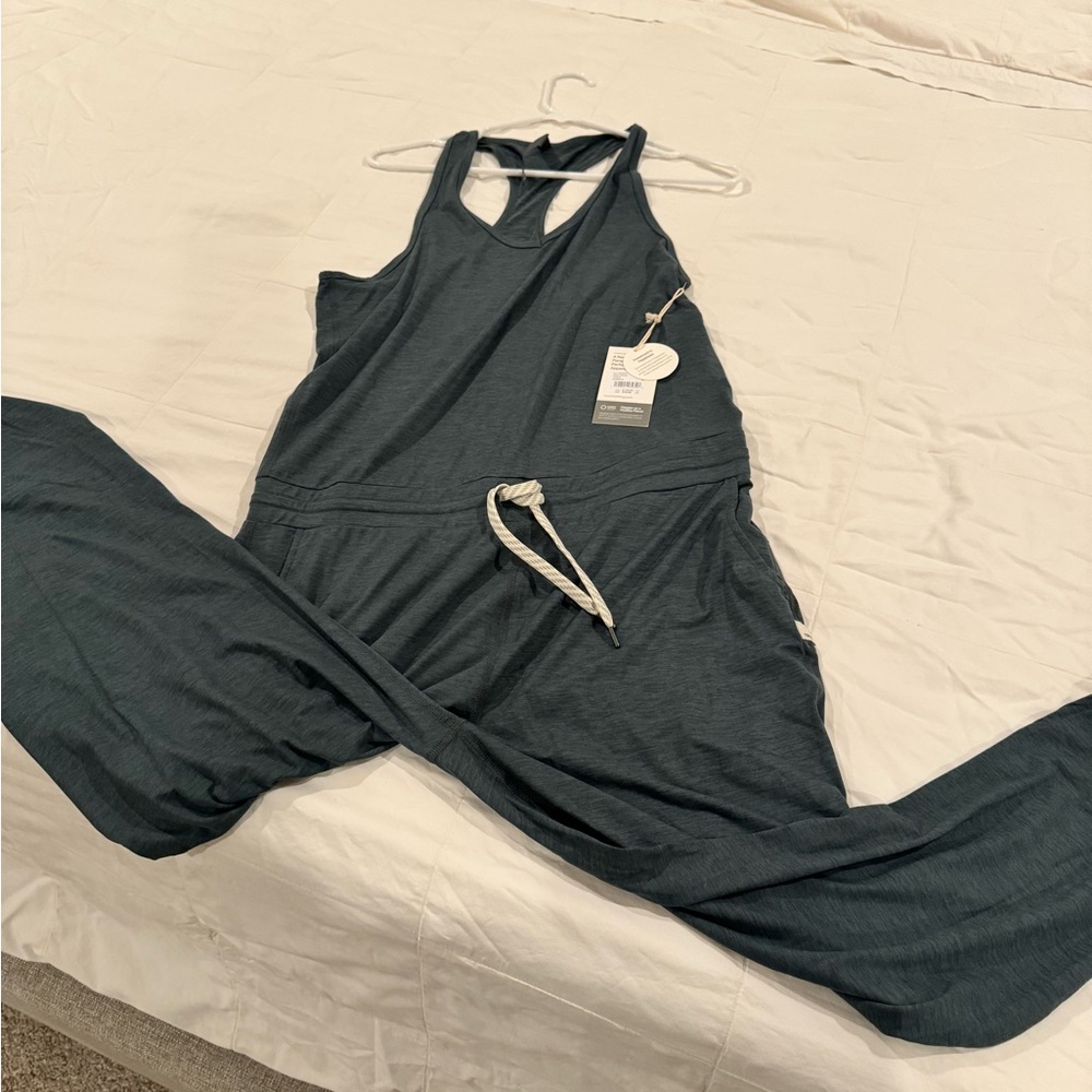 Vuori Lux Jumpsuit NWT color is stone heather, size medium